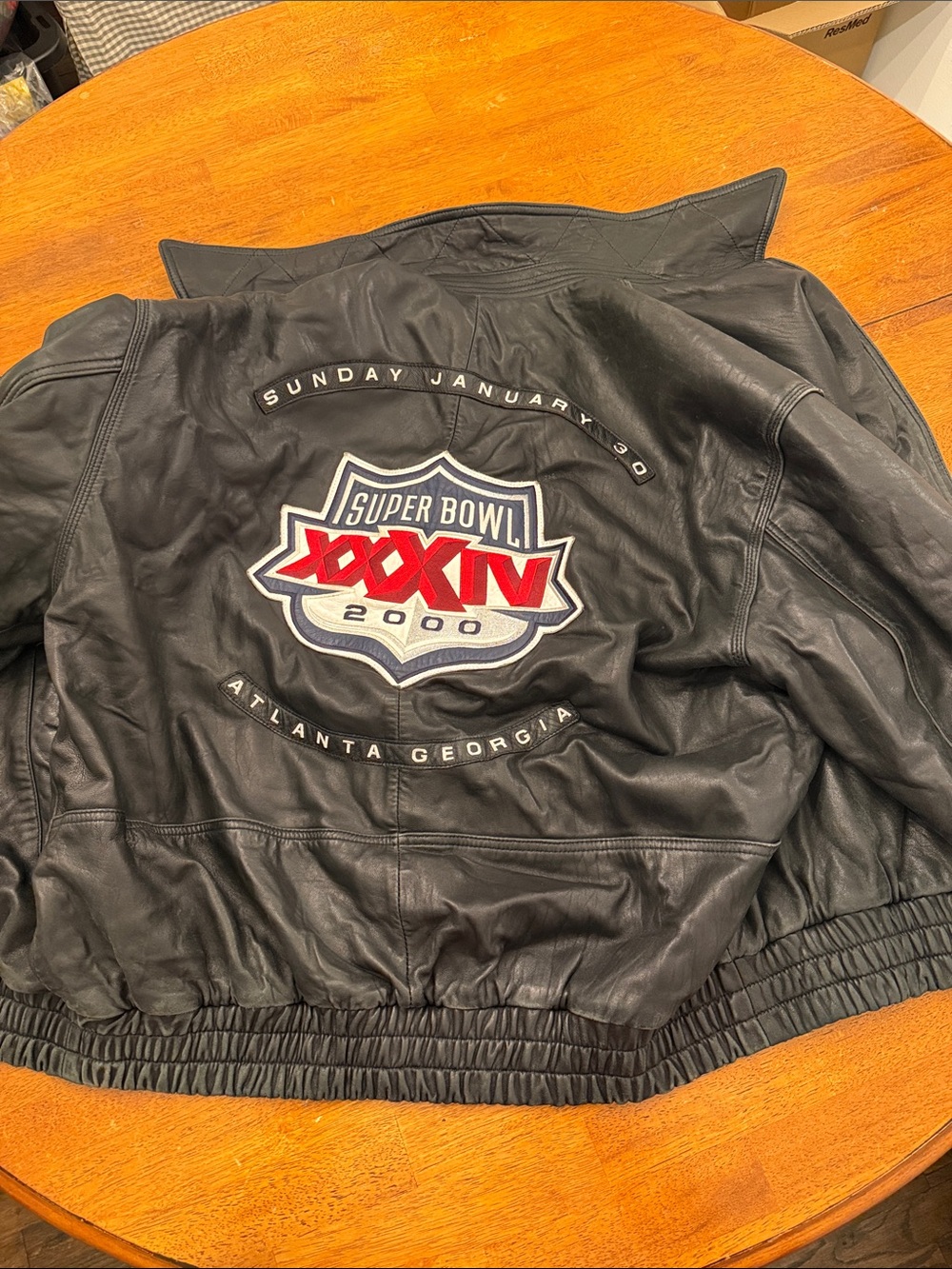 Black Leather Super Bowl XXXIV Bomber Jacket with Red and White Crest Rams xl